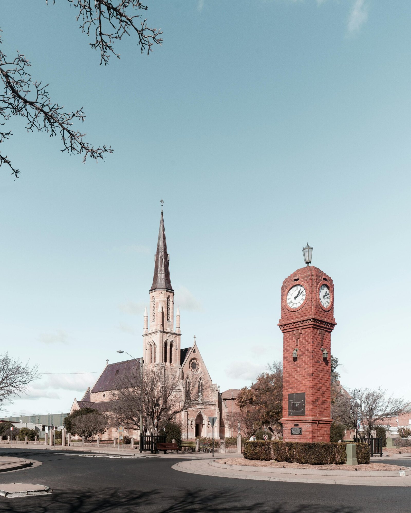 A scenic view of a historic church and clock tower in Mudgee, New South Wales, Australia.